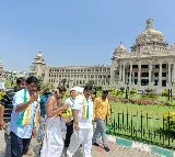 Congress workers purify Karnataka Vidhana Soudha with cow urine