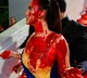 A woman wearing a dress the color of the Ukrainian flag at the Cannes Film Festival