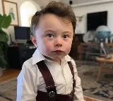 Elon Musk reacts to his AI-generated baby pic