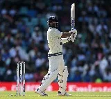 Rahane completes fifty