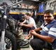 Rahul Gandhi interacts with bike mechanics in Delhi