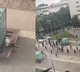 Man keeps eating his sandwich as rioters police clash in France