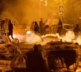 French protesters ram car into mayors house