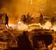 French protesters ram car into mayors house