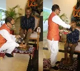 MP CM Chouhan washes tribal man's feet who was urinated on