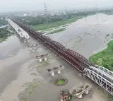 Delhi suburbs on the edge of flood as Yamuna swells dangerously