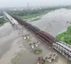 Delhi suburbs on the edge of flood as Yamuna swells dangerously