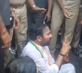 Kishan Reddy sat on road in heavy rain