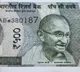 Currency note with star symbol in number panel valid note RBI