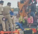 AP Police sent students on a crane in knee deep flood water