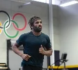 Bajrang Punia, Vinesh Phogat return to India ahead of WFI polls