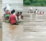 manyam dist peoples cross river to reach hospital in ap