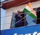 Brother of terrorisnt hoists tri coulour flag