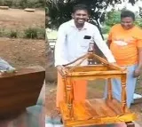 KTR impressed with Handicrafts Carpenter skill
