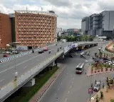 woman dies after falling from hitech city flyover after her bike collides with flyover wall