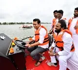 KTR drives a boat in Mid Maneru Reservoir