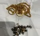 Man held at Hyd airport with gold worth Rs 9.16 lakh