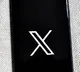 Musk’s X removes most pictures, links tweeted before Dec 2014