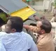 Mangalagiri MLA RK helps to lift overturned auto