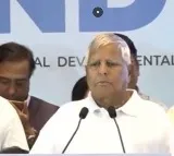Lalu Prasad Yadav Rs 15 lakh jibe at PM Modi