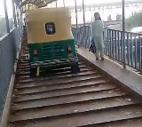Auto Driver Rides On Foot Over Bridge To Escape Traffic In Delhi Arrested