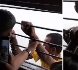 Thief Hangs Outside Window Of Speeding Train