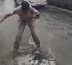 Woman Cop Cleans Clogged Drain With Hand To Clear Waterlogging In Hyderabad