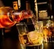 Two volunteers including a women arrested for selling Karnatak liquor in Angallu