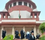 Linking Aadhaar numbers with electoral rolls is not mandatory, EC tells SC