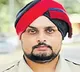 Police officer found alive while being transported for postmortem