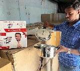 Telangana Congress leader booked for distributing pressure cookers