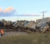 Train carrying military equipment derails in US