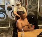 Air Asia CEO Tony Fernandes shirtless during board meating