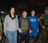 Two American hostages released by Hamas return to Israel