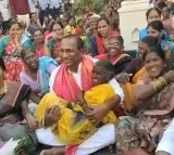 Telangana minister lifts elderly woman in arms during campaign