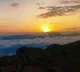 Tourists have to pay to see the rising sun from Vanjangi viewpoint near Paderu