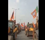 Patancheru Nandishwar Goud took Bulldozer Rally while going to file his nomination papers