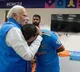 Modi hugs Shami affectionately