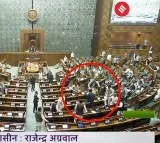 Two men enter Lok Sabha open tear gas canisters
