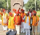 BJP MLAs take oath after boycotting Protem Speaker Akbaruddin Owaisi