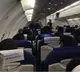 Russian man reaches US without ticket boarding pass passport or visa