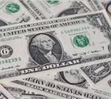 Rupee edges up against US dollar