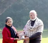 Pranab Mukherjee Daughter Presents A Copy Of Her Book To PM Modi