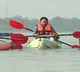 G Kishan Reddy rafts a boat at Kotepally Reservoir