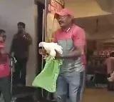 Andhra MLA distributes liquor, live chicken on festival day