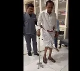 KCR walking with stick in his house