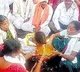 Woman drink two liters of oil in Narnur Kamdev Jatara in Utnur