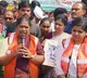 Minister Seethakka sweeping in Medaram