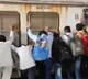 Passengers push Mumbai local train coach to save man
