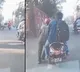 Hyderabad Rapido rider seen pushing scooter with passenger onboard Here is viral video